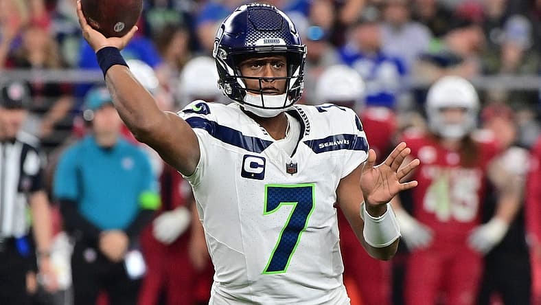 Jan 7, 2024; Glendale, Arizona, USA; Seattle Seahawks quarterback Geno Smith (7) throws in the second half against the Arizona Cardinals at State Farm Stadium. Mandatory Credit: Matt Kartozian-USA TODAY Sports