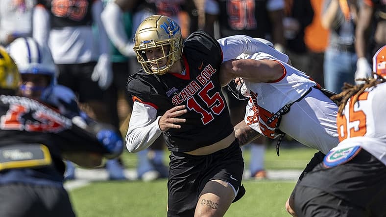At the Senior Bowl, defensive end Laiatu Latu of UCLA (15) attempted to solidify his pre-draft status as a first-round talent. Mandatory Credit: Vasha Hunt-USA TODAY Sports