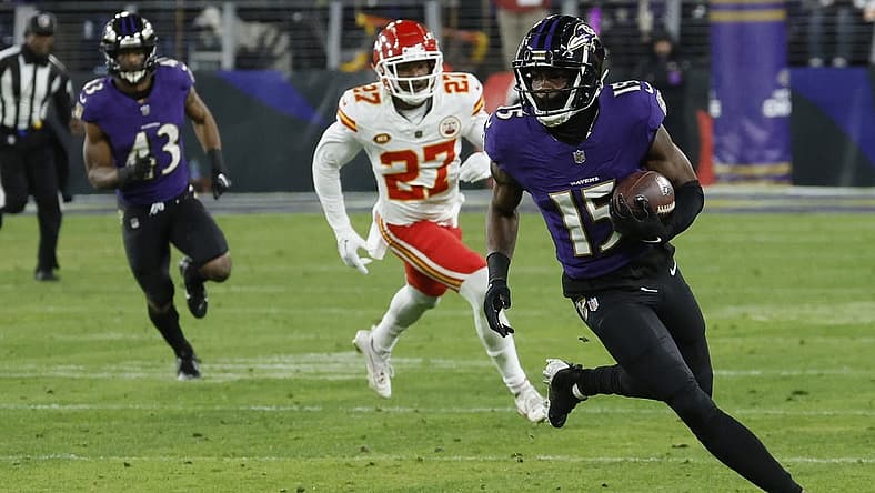 Jan 28, 2024; Baltimore, Maryland, USA; Baltimore Ravens wide receiver Nelson Agholor (15) runs with the ball against the Kansas City Chiefs in the AFC Championship football game at M&T Bank Stadium. Mandatory Credit: Geoff Burke-USA TODAY Sports