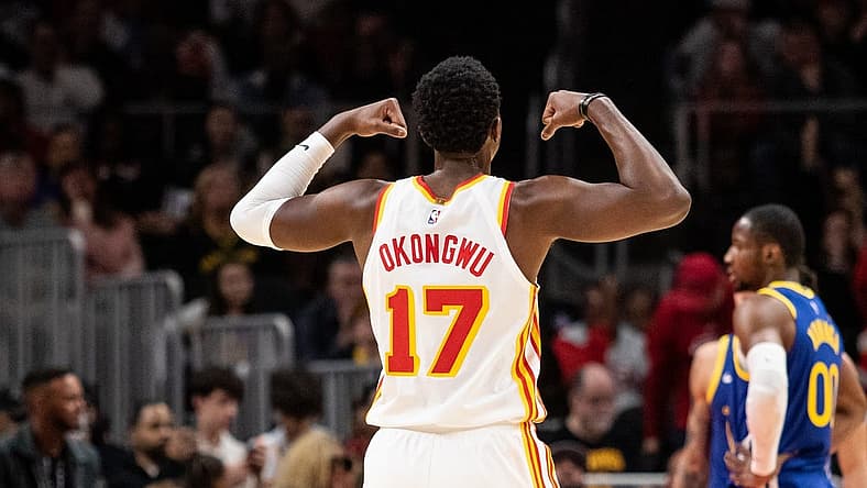 Feb 3, 2024; Atlanta, Georgia, USA; Atlanta Hawks forward Onyeka Okongwu (17) celebrates shot against Golden State Warriors during the third quarter at State Farm Arena. Mandatory Credit: Jordan Godfree-USA TODAY Sports