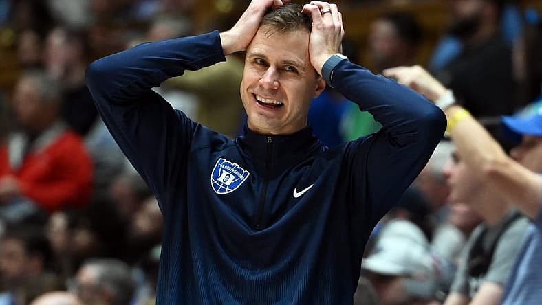 Feb 12, 2024; Durham, North Carolina, USA;  Duke Blue Devils head coach Jon Scheyer reacts during the second half against the Wake Forest Deamon Deacons at Cameron Indoor Stadium. The Blue Devils won 77-69. Mandatory Credit: Rob Kinnan-USA TODAY Sports