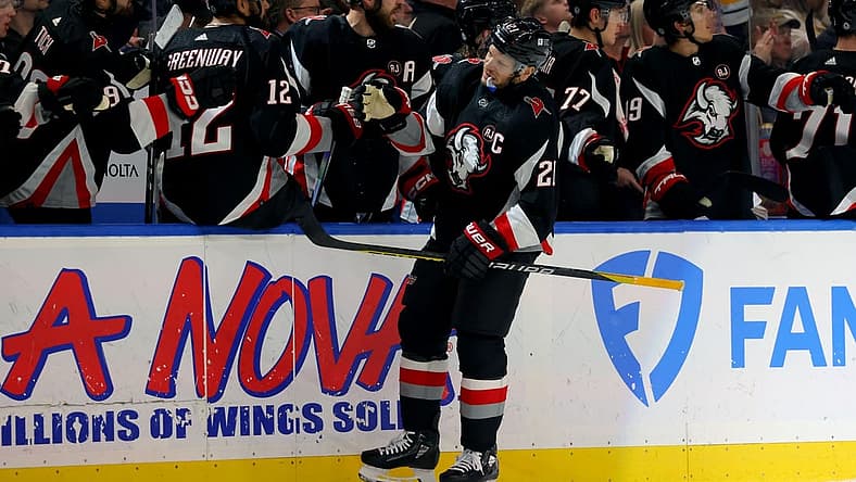 Feb 13, 2024; Buffalo, New York, USA;  Buffalo Sabres right wing Kyle Okposo (21) celebrates his goal with teammates during the first period against the Los Angeles Kings at KeyBank Center. Mandatory Credit: Timothy T. Ludwig-USA TODAY Sports