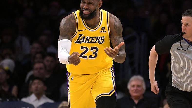 Feb 13, 2024; Los Angeles, California, USA; Los Angeles Lakers forward LeBron James (23) reacts after not getting a foul call in the second half against the Detroit Pistons at Crypto.com Arena. Mandatory Credit: Jayne Kamin-Oncea-USA TODAY Sports