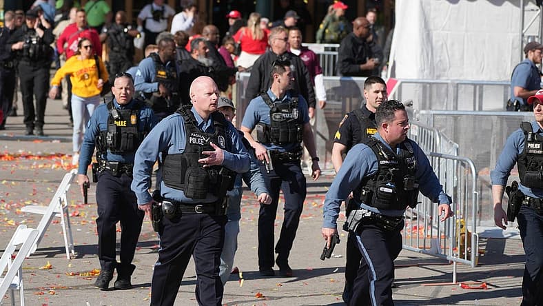Feb 14, 2024; Kansas City, MO, USA; Police respond after gun shots were fired after the celebration of the Kansas City Chiefs winning Super Bowl LVIII. Mandatory Credit: Kirby Lee-USA TODAY Sports