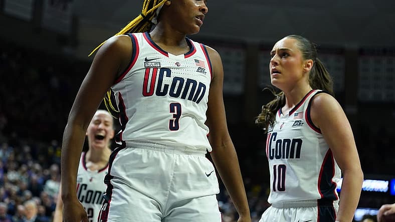 Feb 16, 2024; Storrs, Connecticut, USA; UConn Huskies forward Aaliyah Edwards (3) reacts after blocking a shot from the Georgetown Hoyas in the first half at Harry A. Gampel Pavilion. Mandatory Credit: David Butler II-USA TODAY Sports