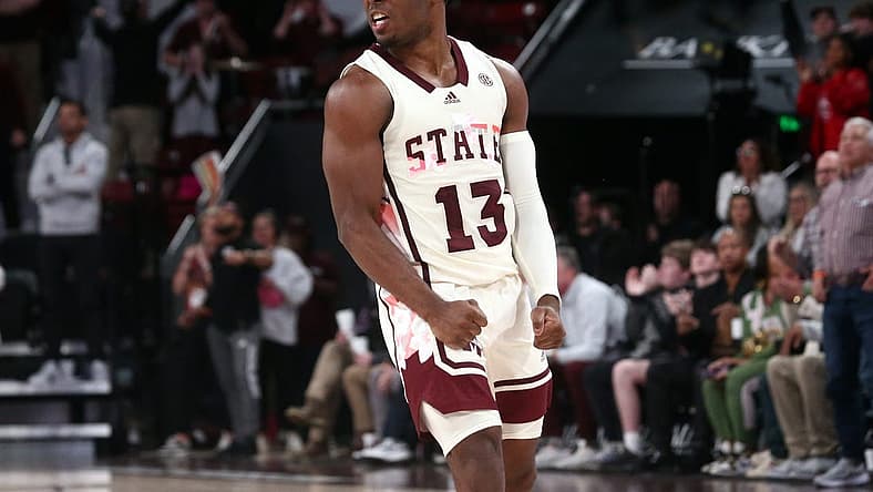 Feb 17, 2024; Starkville, Mississippi, USA; Mississippi State Bulldogs guard Josh Hubbard (13) reacts after a three point basket against the Arkansas Razorbacks during the second half at Humphrey Coliseum. Mandatory Credit: Petre Thomas-USA TODAY Sports
