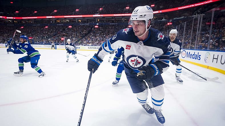 Feb 17, 2024; Vancouver, British Columbia, CAN; Winnipeg Jets forward Sean Monahan (23) skates against the Vancouver Canucks in the second period at Rogers Arena. Mandatory Credit: Bob Frid-USA TODAY Sports