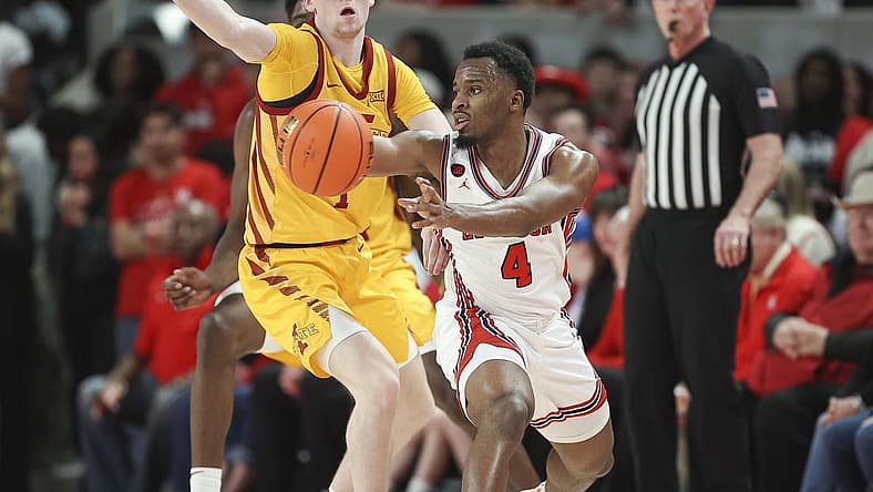 Feb 19, 2024; Houston, Texas, USA; Houston Cougars guard L.J. Cryer (4) passes the ball during the first half against the Iowa State Cyclones at Fertitta Center. Mandatory Credit: Troy Taormina-USA TODAY Sports