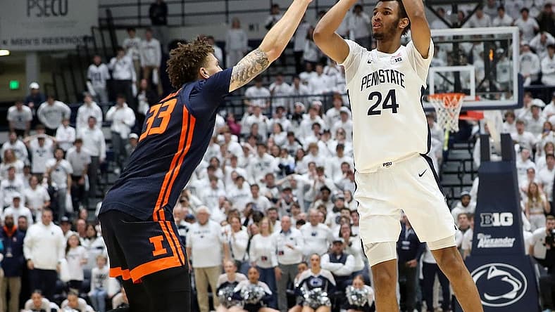 Feb 21, 2024; University Park, Pennsylvania, USA; Penn State Nittany Lions forward Zach Hicks (24) shoots before being fouled by Illinois Fighting Illini forward Coleman Hawkins (33) during the second half at Rec Hall. Penn State defeated Illinois 90-89. Mandatory Credit: Matthew O'Haren-USA TODAY Sports