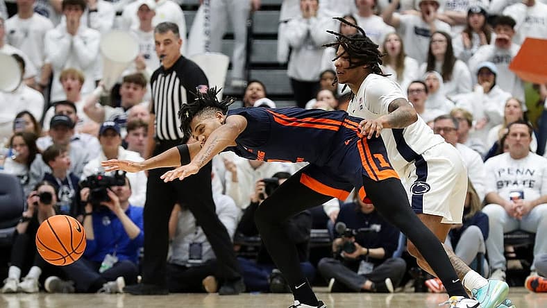 Feb 21, 2024; University Park, Pennsylvania, USA; Illinois Fighting Illini guard Terrence Shannon Jr (0) loses control of the ball during the second half against the Penn State Nittany Lions at Rec Hall. Penn State defeated Illinois 90-89. Mandatory Credit: Matthew O'Haren-USA TODAY Sports