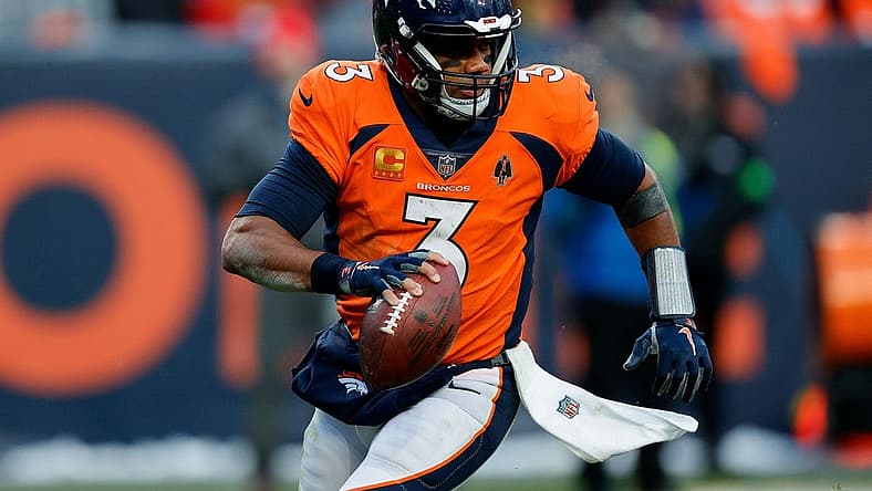 Oct 29, 2023; Denver, Colorado, USA; Denver Broncos quarterback Russell Wilson (3) scrambles in the fourth quarter against the Kansas City Chiefs at Empower Field at Mile High. Mandatory Credit: Isaiah J. Downing-USA TODAY Sports