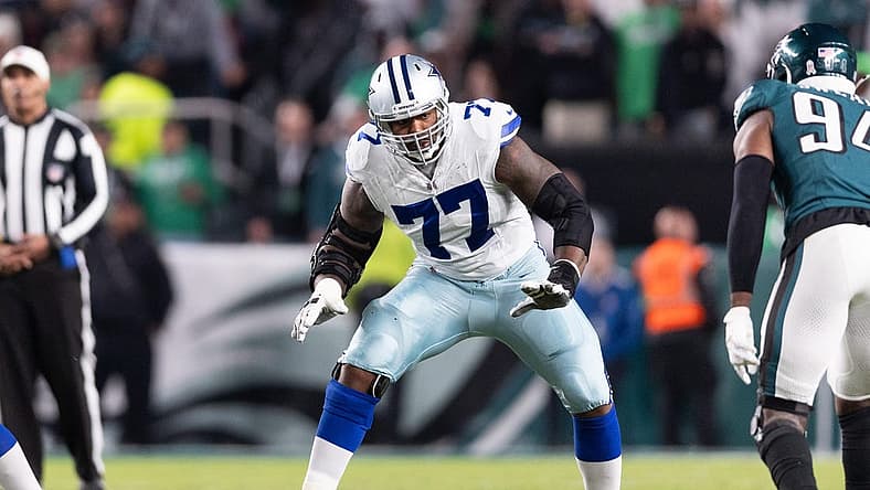 Nov 5, 2023; Philadelphia, Pennsylvania, USA; Dallas Cowboys offensive tackle Tyron Smith (77) in action against the Philadelphia Eagles at Lincoln Financial Field. Mandatory Credit: Bill Streicher-USA TODAY Sports