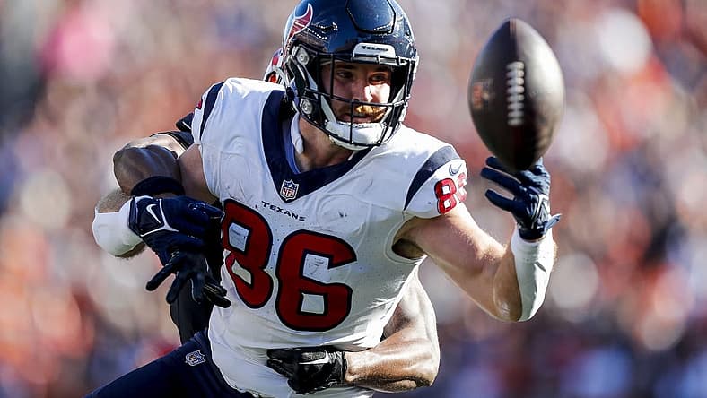 Nov 12, 2023; Cincinnati, Ohio, USA; Houston Texans tight end Dalton Schultz (86) attempts to catch a pass against Cincinnati Bengals safety Dax Hill (23) in the first half at Paycor Stadium. Mandatory Credit: Katie Stratman-USA TODAY Sports
