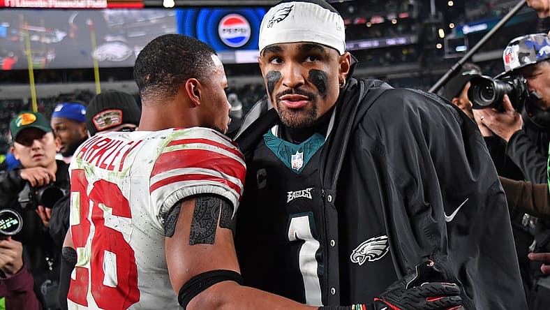 Dec 25, 2023; Philadelphia, Pennsylvania, USA; New York Giants running back Saquon Barkley (26) and Philadelphia Eagles quarterback Jalen Hurts (1) after game at Lincoln Financial Field. Mandatory Credit: Eric Hartline-USA TODAY Sports