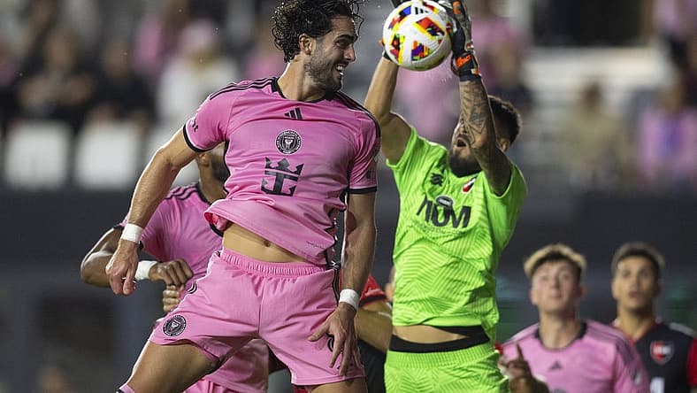 Feb 15, 2024; Fort Lauderdale, FL, USA; Inter Miami CF forward Leonardo Campana (8) attempts to connect a header against Newell s Old Boys goalkeeper Lucas Hoyos (1) during the second half at DRV PNK Stadium. Mandatory Credit: Sam Navarro-USA TODAY Sports