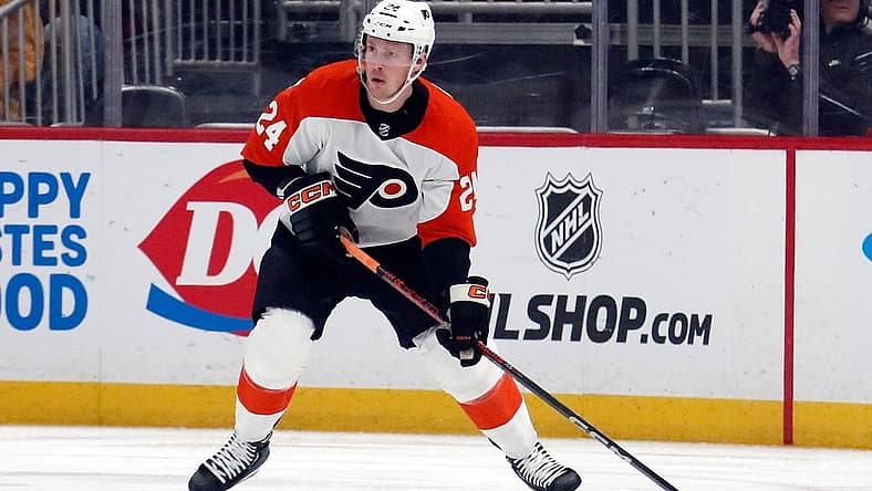 Feb 25, 2024; Pittsburgh, Pennsylvania, USA; Philadelphia Flyers defenseman Nick Seeler (24) handles the puck against the Pittsburgh Penguins during the first period at PPG Paints Arena. Mandatory Credit: Charles LeClaire-USA TODAY Sports