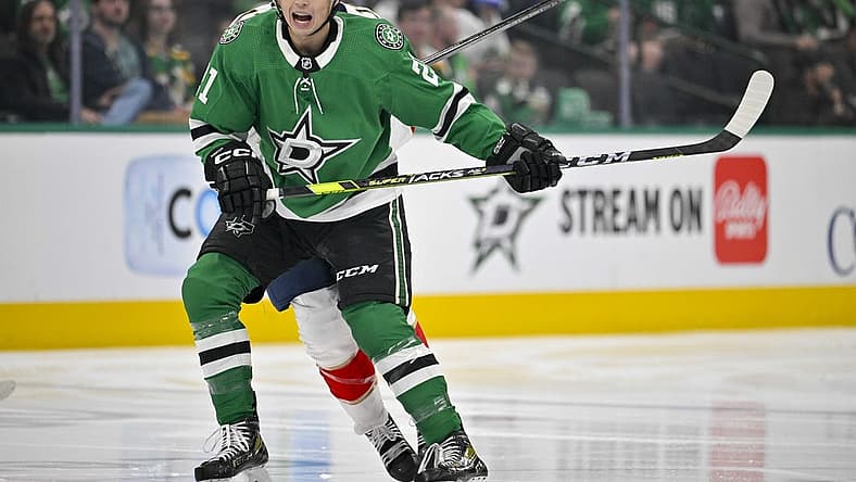 Mar 12, 2024; Dallas, Texas, USA; Dallas Stars left wing Jason Robertson (21) calls for the puck during the first period against the Florida Panthers at the American Airlines Center. Mandatory Credit: Jerome Miron-USA TODAY Sports