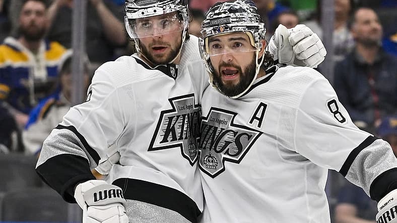 Mar 13, 2024; St. Louis, Missouri, USA; Los Angeles Kings right wing Adrian Kempe (9) celebrates with defenseman Drew Doughty (8) after scoring against the St. Louis Blues during the third period at Enterprise Center. Mandatory Credit: Jeff Curry-USA TODAY Sports