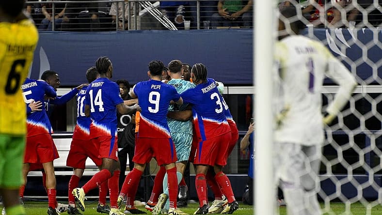 Mar 21, 2024; Arlington, Texas, USA; The United States team celebrates scoring the game tying goal against Jamaica goalkeeper Andre Blake (1) during the second half at AT&T Stadium. Mandatory Credit: Jerome Miron-USA TODAY Sports