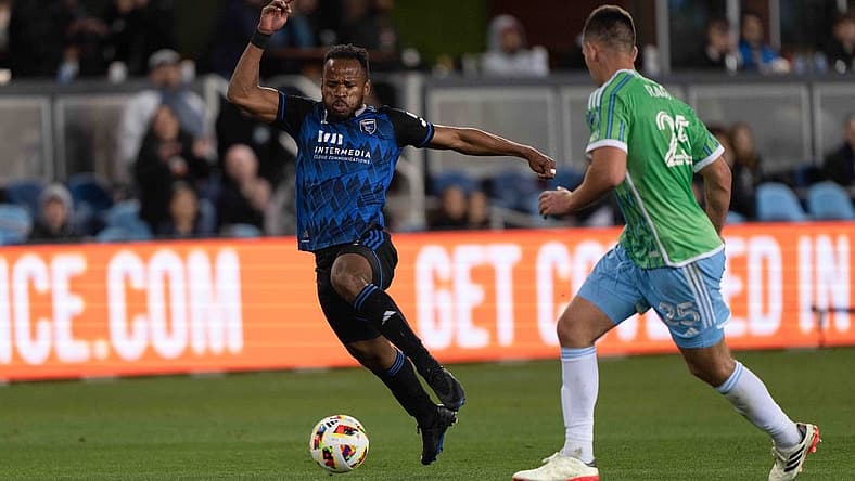 Mar 24, 2024; San Jose, California, USA; San Jose Earthquakes forward Jeremy Ebobisse (11) dribbles against Seattle Sounders FC defender Jackson Ragen (25) during the second half at PayPal Park. Mandatory Credit: Stan Szeto-USA TODAY Sports
