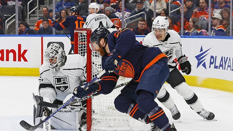 Mar 28, 2024; Edmonton, Alberta, CAN; Edmonton Oilers forward Connor Brown (28) tries to jam a puck past Los Angeles Kings goaltender Cam Talbot (39) during the first period at Rogers Place. Mandatory Credit: Perry Nelson-USA TODAY Sports