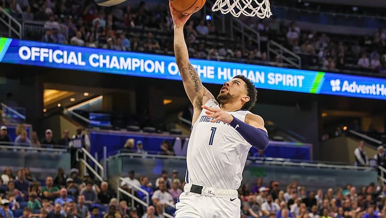 Mar 30, 2024; Orlando, Florida, USA; Memphis Grizzlies guard Scotty Pippen Jr. (1) goes to the basket during the second half against the Orlando Magic at KIA Center. Mandatory Credit: Mike Watters-USA TODAY Sports