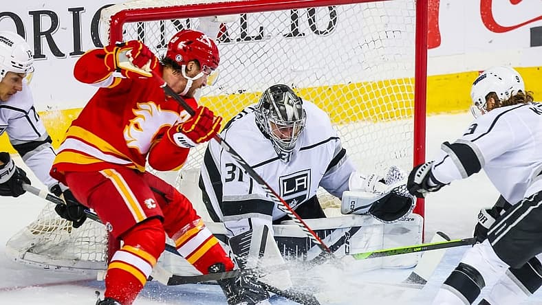 Mar 30, 2024; Calgary, Alberta, CAN; Los Angeles Kings goaltender David Rittich (31) makes a save against the Calgary Flames during the first period at Scotiabank Saddledome. Mandatory Credit: Sergei Belski-USA TODAY Sports