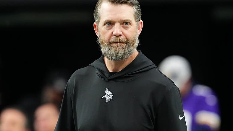 Dec 10, 2023; Paradise, Nevada, USA; Minnesota Vikings Offensive Coordinator Wes Phillips walks on the field before a game between the Vikings and the Las Vegas Raiders at Allegiant Stadium. Mandatory Credit: Stephen R. Sylvanie-USA TODAY Sports