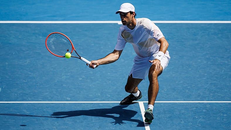 Jan 22, 2024; Melbourne, Victoria, Australia;
Nuno Borges of Portugal hits a shot against Daniil Medvedev of Russia in the fourth round of the men s singles at the Australian Open in Melbourne
Mandatory Credit: Mike Frey-USA TODAY Sports