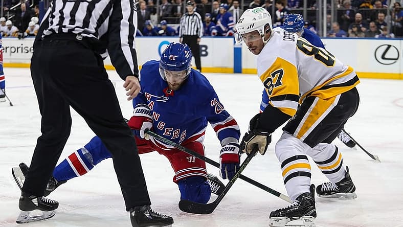 Apr 1, 2024; New York, New York, USA; New York Rangers center Barclay Goodrow (21) and Pittsburgh Penguins center Sidney Crosby (87) battle after a face-off during the second period at Madison Square Garden. Mandatory Credit: Danny Wild-USA TODAY Sports