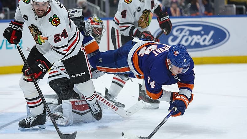 Apr 2, 2024; Elmont, New York, USA; New York Islanders center Bo Horvat (14) after shot in front of the goal against the Chicago Blackhawks during the second period at UBS Arena. Mandatory Credit: Thomas Salus-USA TODAY Sports