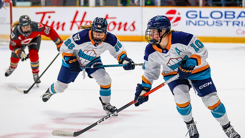 Sarah Fillier carries the puck for the New York Sirens, with rookie forward Casey O'Brien trailing.