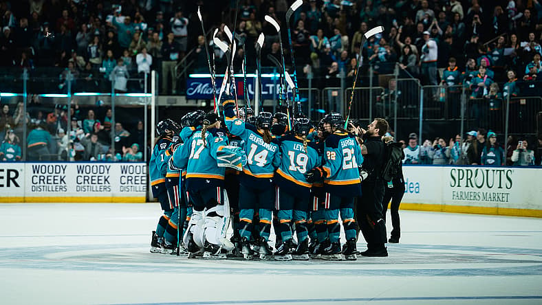 The New York Sirens huddle at center ice to celebrate a 2-1 shootout win over the Seattle Torrent at Madison Square Garden.