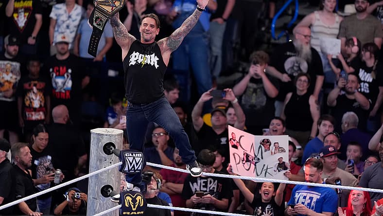 CM Punk stands on the ropes after being introduced during WWE Friday Night SmackDown at Paycom Center in Oklahoma City, Friday,