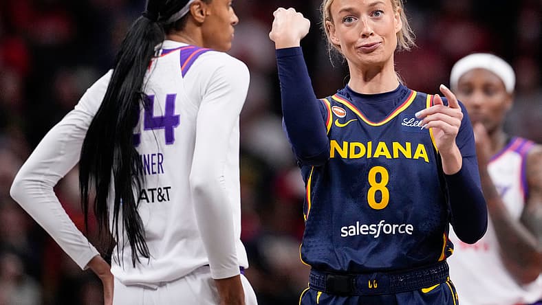 Indiana Fever guard Sophie Cunningham (8) points to Phoenix Mercury forward-guard DeWanna Bonner (24) after an argument between