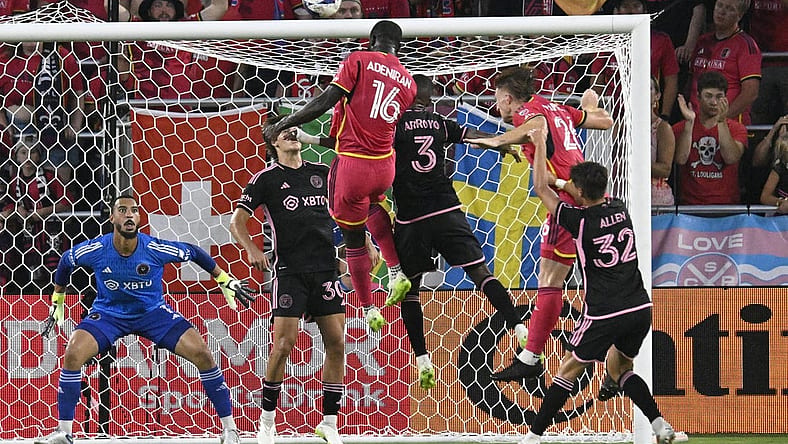 Jul 15, 2023; St. Louis, Missouri, USA; St. Louis City player Samuel Adeniran (16) heads the ball for a goal against Inter Miami midfielder Dixon Arroyo (3) and Inter Miami goalkeeper Drake Callender (1) in the first half at CITYPARK. Mandatory Credit: Scott Rovak-USA TODAY Sports