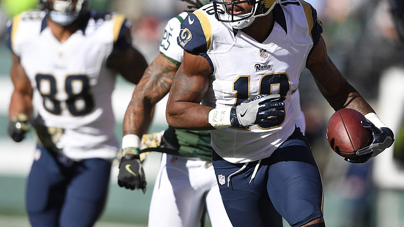 Caption: Nov 13, 2016; East Rutherford, NJ, USA; Los Angeles Rams wide receiver Kenny Britt (18) carries the ball in the first half against the New York Jets at MetLife Stadium. The Rams defeated the Jets 9-6. Mandatory Credit: Kirby Lee-USA TODAY Sports