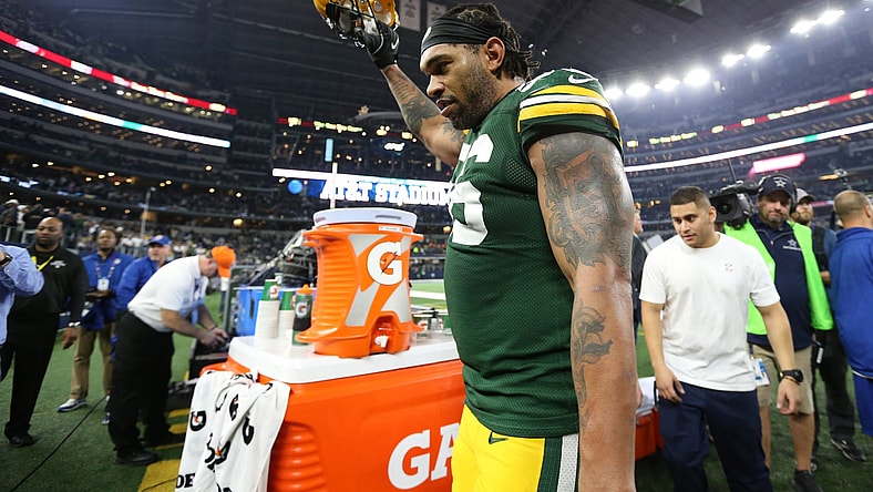 Caption: Jan 15, 2017; Arlington, TX, USA; Green Bay Packers linebacker Julius Peppers (56) celebrates a victory against the Dallas Cowboys in the NFC Divisional playoff game at AT&T Stadium. Mandatory Credit: Matthew Emmons-USA TODAY Sports