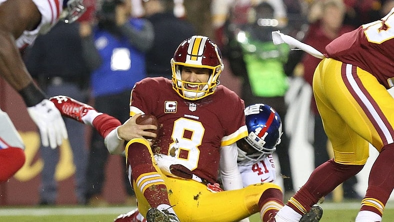 Caption: Jan 1, 2017; Landover, MD, USA; Washington Redskins quarterback Kirk Cousins (8) is sacked by New York Giants cornerback Dominique Rodgers-Cromartie (41) in the second quarter at FedEx Field. Mandatory Credit: Geoff Burke-USA TODAY Sports
