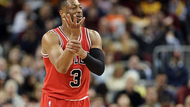 Feb 25, 2017; Cleveland, OH, USA; Chicago Bulls guard Dwyane Wade (3) reacts toward the Bulls bench after a play during the second half against the Cleveland Cavaliers at Quicken Loans Arena. The Bulls won 117-99. Mandatory Credit: Ken Blaze-USA TODAY Sports