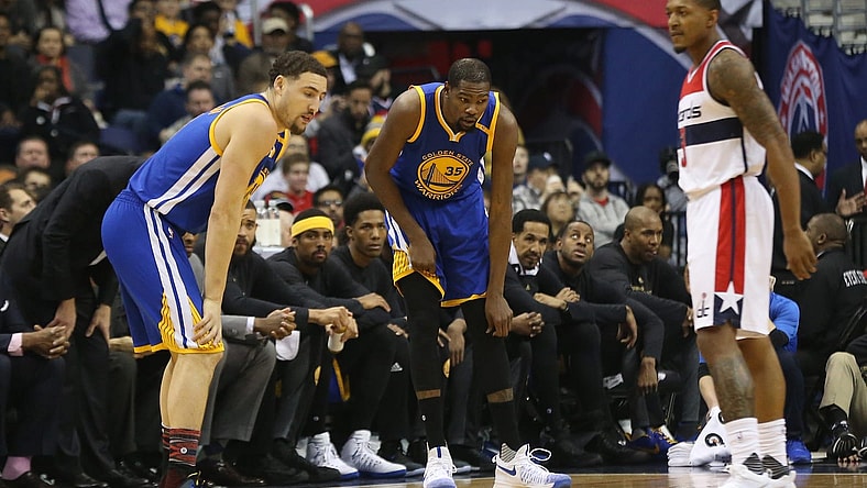 Feb 28, 2017; Washington, DC, USA; Golden State Warriors forward Kevin Durant (35) holds his knee after being injured against the Washington Wizards in the first quarter at Verizon Center. Mandatory Credit: Geoff Burke-USA TODAY Sports
