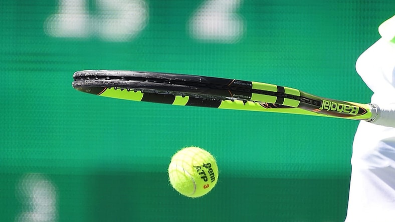 Caption: Mar 12, 2017; Indian Wells, CA, USA; Rafael Nadal (ESP) bounces the ball as he gets set to serve during his second round match as he defeated Guido Pella (not pictured) in the BNP Paribas Open at the Indian Wells Tennis Garden. Nadal won 6-3, 6-2. Mandatory Credit: Jayne Kamin-Oncea-USA TODAY Sports