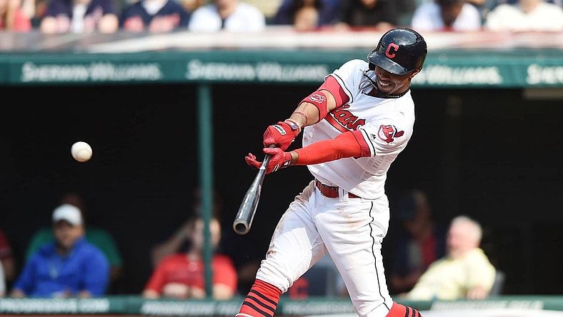 Apr 15, 2017; Cleveland, OH, USA; Cleveland Indians shortstop Francisco Lindor hits a single during the second inning against the Detroit Tigers at Progressive Field. Mandatory Credit: Ken Blaze-USA TODAY Sports