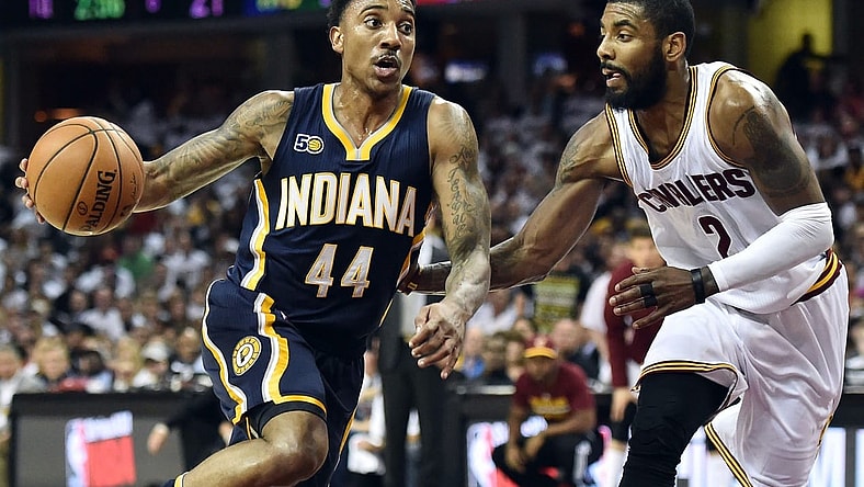 Caption: Apr 17, 2017; Cleveland, OH, USA; Indiana Pacers guard Jeff Teague (44) drives to the basket against Cleveland Cavaliers guard Kyrie Irving (2) during the first half in game two of the first round of the 2017 NBA Playoffs at Quicken Loans Arena. Mandatory Credit: Ken Blaze-USA TODAY Sports