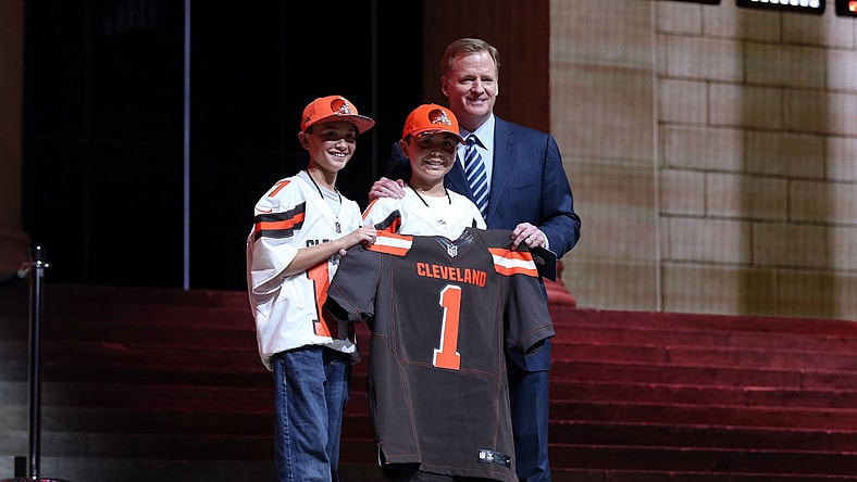 Apr 27, 2017; Philadelphia, PA, USA; NFL commissioner Roger Goodell (right) poses with 2 Cleveland Browns fans as Myles Garrett (Texas A&M), not pictured) is selected as the number 1 overall pick to the Cleveland Browns in the first round the 2017 NFL Draft at Philadelphia Museum of Art. Mandatory Credit: Bill Streicher-USA TODAY Sports