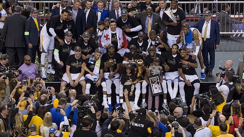 Warriors pose after winning the 2017 NBA Finals