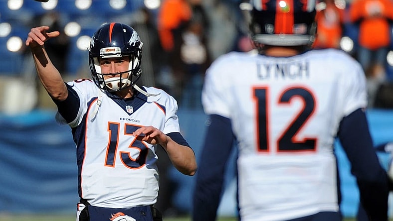 Paxton Lynch and Trevor Siemian warming up before a Broncos game