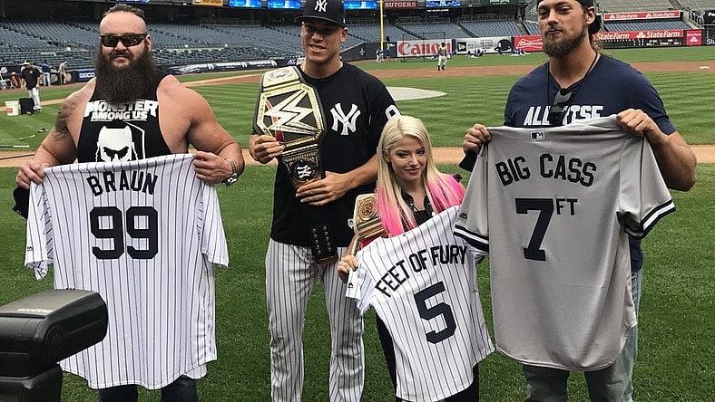 Aaron Judge receives championship belt from these WWE superstars.