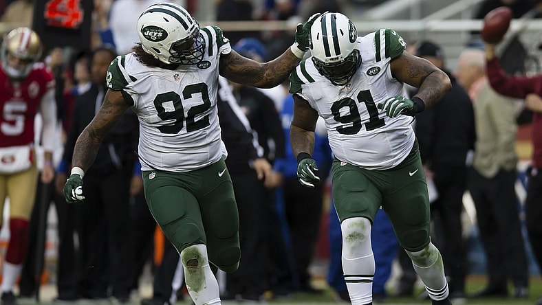 Jets Leonard Williams celebrates with defensive end Sheldon Richardson