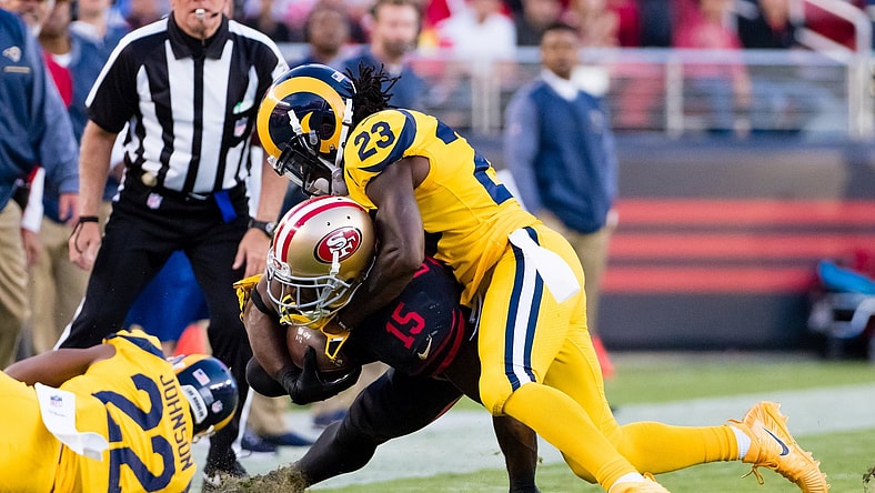 Nickell Robey-Coleman tackles Pierre Garcon